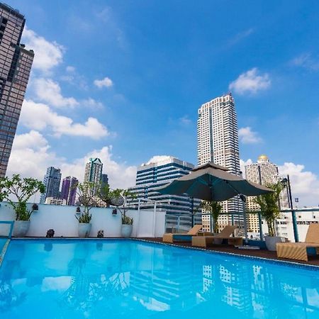Sapphire Hotel Silom Бангкок Экстерьер фото The pool at the rooftop of the hotel