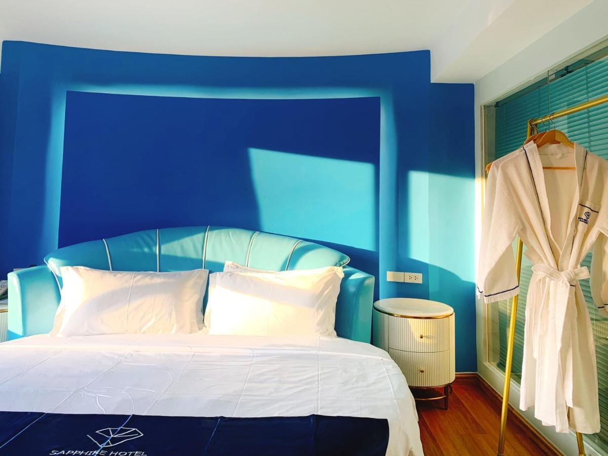 Sapphire Hotel Silom Бангкок Экстерьер фото A bathrobe hanging on a hanger